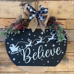 Wood Circle with the word Believe Holiday Wood Wreath, Circular Christmas Sign, Cricut Christmas Wooden Signs, Round Door Signs Diy Christmas, Round Door Signs Diy Cricut, Round Holiday Signs, Round Door Signs Christmas, Round Christmas Signs Wood, Christmas Round Signs