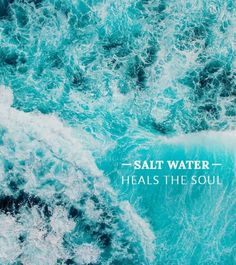 the words salt water heals the soul are overlaid by blue ocean foamy waves