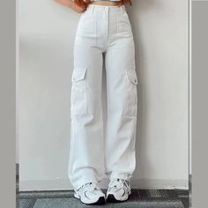 Fabricated with polyester, this garment features a secure zipper closure and a mid-rise waist. DETAILSMaterial: PolyesterClosure Type: Zipper FlyWaist Type: Mid Beige Sweatpants, Celana Kargo, Celana Fashion, Cargo Pants Streetwear, Match Three, Chique Outfit, Batik Pattern, Weave Style, Pant Style