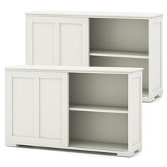 two white bookcases with doors on each side