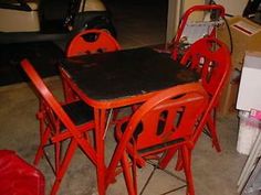 the table and chairs are red in color