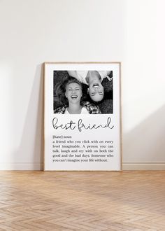 a framed photo with the words best friend on it in front of a white wall