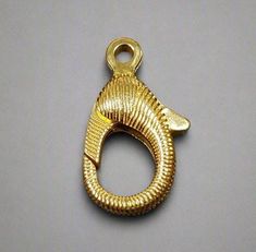 1. Gold Filled Textured Lobster Clasps 2. Made to Order 3. Price Per Piece 4. Jewelry Type - Lobster Clasps 5. Total Weight - 2.080 Gram Approx.  6. Clasps Size - 17 x 10 MM 7. Ready to Dispatch in 1 - 2 days. 8. Handmade Items 9. Amazing Quality Clasps 10. 500 + Quantity Available 11. Openable Clasps 12. Solid Clasps 13. Textured Clasps    Pictures are taken under natural and day light. Necklace Clasps, Lobster Clasp, Gold Texture, Gold Filled, Handmade Items, Jewelry Making, Texture, Craft Supplies, Gold