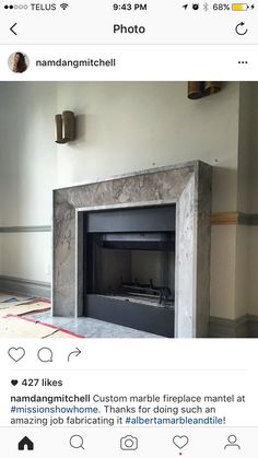 an instagramted photo of a fireplace in a living room with the caption's tweet