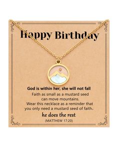 a necklace with the words happy birthday written on it and an image of a mountain