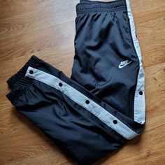 Nike Sweatpants That Has Buttons On The Side Of The Legs Has Zipper Pockets Men Xl Nike Trackpants, Nike Track Pants Mens, Nike Sweatpants Mens, Nike Track Pants, Basketball Pants, Track Pants Mens, Pants Nike, Nike Joggers, Nylon Pants