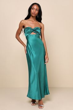 You'll be looking especially extraordinary in the Lulus So Rare Emerald Green Satin Strapless Twist-Front Midi Dress! Glossy woven satin shapes this head-turning dress that falls from a strapless, sweetheart neckline (with hidden no-slip strips) into a pleated, twist-front bodice that creates a flirty cutout. The high, fitted waist sits atop a figure-skimming slip skirt that finishes at a chic midi hem. Turn around to reveal two elasticized straps that lay across the otherwise open-back design. Long Guest Wedding Dress, Pre-draped Satin Strapless Cocktail Dress, Pre-draped Satin Strapless Dress For Gala, Open Back Wedding Guest Dress, Formal Pre-draped Strapless Satin Dress, Strapless Silk Satin Cocktail Dress, Silk Satin Strapless Cocktail Dress, Draped Satin Strapless Dress For Gala, Strapless Silk Satin Formal Dress