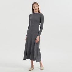 The Anita Long Sleeve Merino Wool Dress features soft ribbing crafted from a luxurious blend of 50% merino wool and 50% organic cotton, showcasing a feminine, slim-fit bodice that flows into a flared hem. Featuring a boat neck, a waistband, long sleeves,  and midi-length, it’s an event-ready piece perfect for transeasonal occasions.  Model is 5’8 1/2 (174cm) and wears XS/S.   Material: 50% Merino Wool 50% Organic Cotton Hand wash cold with wool-friendly detergent or professional dry clean. Material: 50% Merino Wool 50% Organic Cotton Hand wash cold with wool-friendly detergent or professional dry clean. Merino Wool Dress, September Birthstone Jewelry, Gifts For New Mums, Pearl Jewellery Earrings, Wool Dress, Dress C, Fashion Jewellery, Independent Designers Fashion, Gifts For New Moms