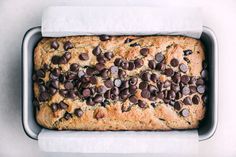 a loaf of chocolate chip bread in a pan