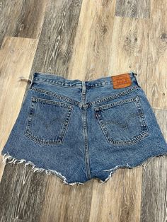 Brand: LEVIS Style: SHORTS Color: DENIM BLUE Size: 12/31SKU: 137-13745-279527 CONDITION: GENTLY USED Blue Jeans With Frayed Hem Short Leg, Blue Denim Cutoff Bottoms, Medium Wash Cutoff Bottoms With Five Pockets, Levis Style, Style Shorts, Levi Shorts, Denim Blue, Christmas List, Blue Denim