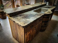 an old fashioned kitchen island with two sinks