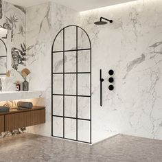 a bathroom with marble walls and flooring