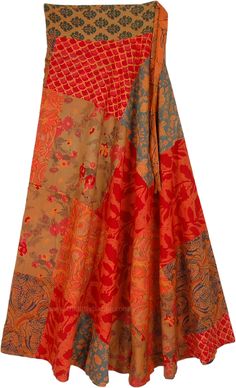 A classy bohemian reversible wrap-around skirt in bright shades of red and orange colors.  One side of the skirt has beautiful floral patchwork and the reverse side of the skirt has swirly waves print in complimenting colors. #tlb #WrapAroundSkirt #Patchwork #Floral #Printed #bohemianfashion #Handmade #reversibleskirt #patchworkskirt #wrapskirt #floralskirt Spring Red Patchwork Skirt, Red Patchwork Skirt For Spring, Red Bohemian Wrap Skirt For Summer, Bohemian Red Flowy Wrap Skirt, Red Bohemian Wrap Skirt, Bohemian Red Skirt With Patchwork, Complimenting Colors, Classy Bohemian, Reversible Wrap Skirt