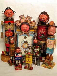 an assortment of antique items are displayed on a white background, including tins and other objects