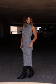 As the weather cools down, stay chic and cozy in our Comfortable Class Dress. This elegant maxi dress features a turtleneck and sleeveless design, perfect for the early fall season. Made from soft sweater fabric, this dress is both classy and comfortable. Fabric 100% acrylic Chic Sleeveless Sweater Dress For Fall, Chic Sleeveless Stretch Sweater Dress, Chic Fitted Turtleneck Maxi Dress, Chic Winter Maxi Dress, Elegant Turtleneck Maxi Dress For Fall, Turtleneck Dress For Date Night In Winter, Casual Stretch Midi Dress For Winter, Winter Turtleneck Dress For Date Night, Trendy Sleeveless Winter Dress