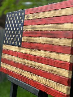 an american flag made out of wooden planks