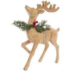 a wooden reindeer ornament with holly on its antlers