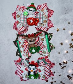 three christmas wreaths hanging on the wall