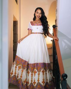 This exquisite Habesha dress, featuring a stunning design, is perfect for weddings and special occasions. Crafted with traditional Ethiopian elegance, this Habesha Kemis blends rich cultural heritage with modern style, making it a standout choice for any event. Material Cotton Menen Thread Estimated delivery : 1 week to 2 weeks Contact WhatsApp +1(304)-306-2784Email: contact@ethiopian.store Habesha Dress Modern, Ethiopian Wedding Dress, Ethiopian Wedding, Habesha Dress, Ethiopian Dress, Habesha Kemis, Dress Modern, Modern Dress, Event Styling