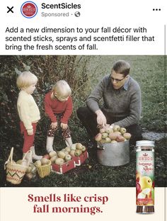 a man and two children picking apples out of a bucket with the caption smells like crisp fall mornings