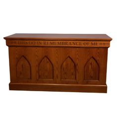 a wooden casket with the words this is an remembrance of me on it's side