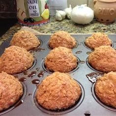 freshly baked muffins are sitting in the pan