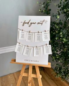 a seating chart on top of a easel