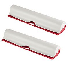 two red and white plastic toothbrush holders on a white background, one is empty