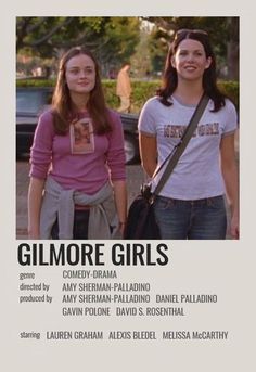 two girls standing next to each other in front of a sign that says, gilmore girls