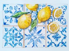 watercolor painting of lemons on blue tile