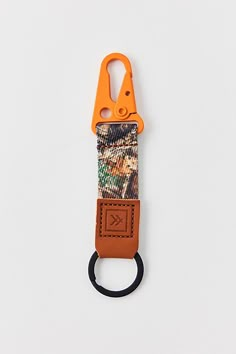 Durable Thread keychain trimmed in leather with a utilitarian key clip that's perfect clip to your Thread bag, water bottle or BDG jeans. Features Thread keychain clip Substantial Thread keychain Sturdy woven design Leather trim Durable metal keyhook Content + Care Polyester, leather, metal Spot clean Imported Size Dimensions: 6" l x 1" w | Thread Keychain Clip in Camo, Women's at Urban Outfitters Thread Keychain, Boyfriend Keychain, Clip Keychain, Mens Keychains, Keychain Clip, Bdg Jeans, Key Clip, Bag Clips, Woven Design