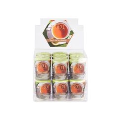 six jars of orange and green candles in a display case with the words hot on them