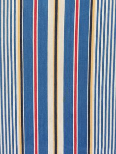 a blue and white striped shirt with red, yellow, and blue stripes