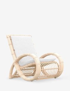 a chair made out of wicker with a cushion on it's back end