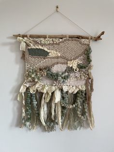 a wall hanging made out of various materials