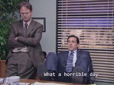 two men in suits sitting at a desk with the caption what a horrible day