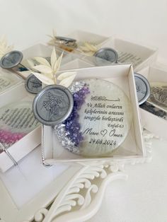 wedding favors in a box on a table