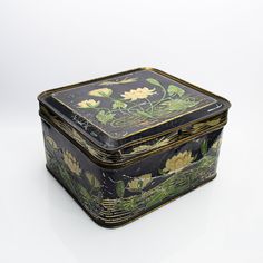 a black box with flowers painted on it