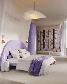 a bedroom with purple and white decor in the corner, along with a large bed