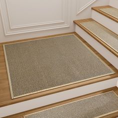 a set of stairs with carpet on them