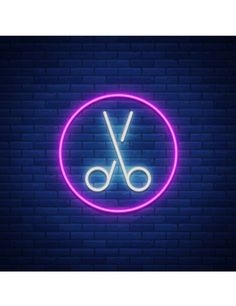 a neon sign that says scissors in a circle on a brick wall with a blue background