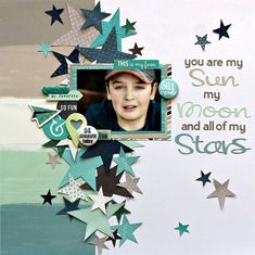 a scrapbook page with an image of a boy in the middle and stars around it