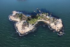 an island in the middle of some water