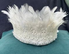 Beautiful white feather crown with white lace and a diamanté trim.  Handmade to order. White Fantasy Headpiece For Party, White Feathered Party Headpieces, White Feathered Headpieces For Evening, White Feathered Hat Headpiece, White Feathered Evening Headpieces, Feather Crown, White Feathers, Costume Hats, Costume Accessories