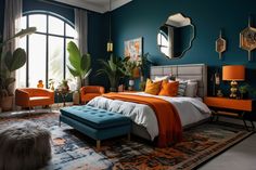 a bedroom with blue walls, orange accents and a large bed in front of a window