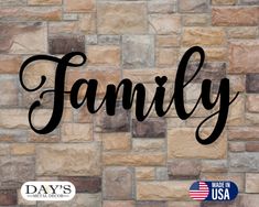 a brick wall with the word family written in cursive black ink on it