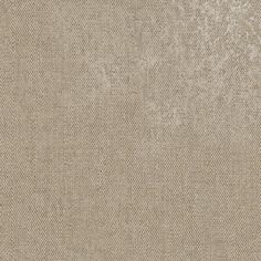 a beige fabric textured with small dots