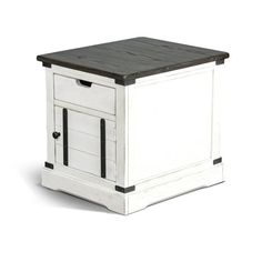 a white and black table with drawers on it