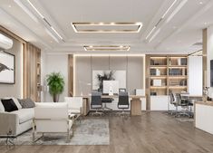 an office with white furniture and wood flooring in the center is lit by recessed lighting