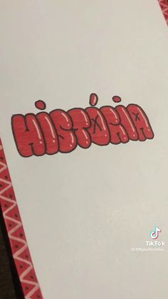 a close up of a piece of paper with the word hippop written on it